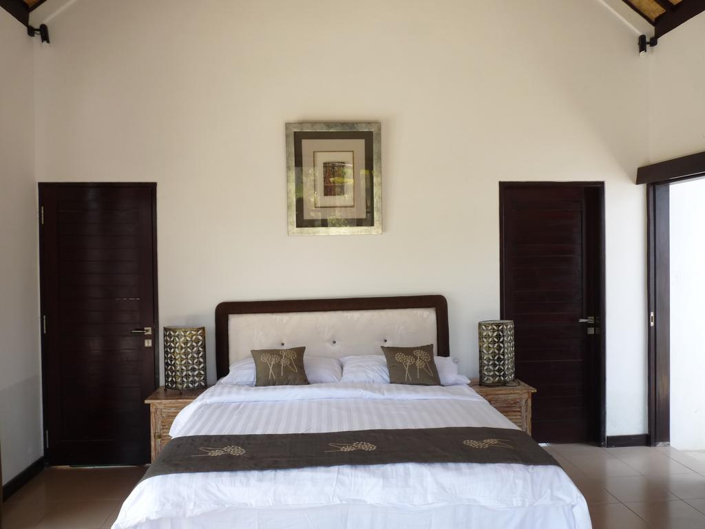Taman Dewi Sri Villa Et Bungalow Pemuteran Habitación foto