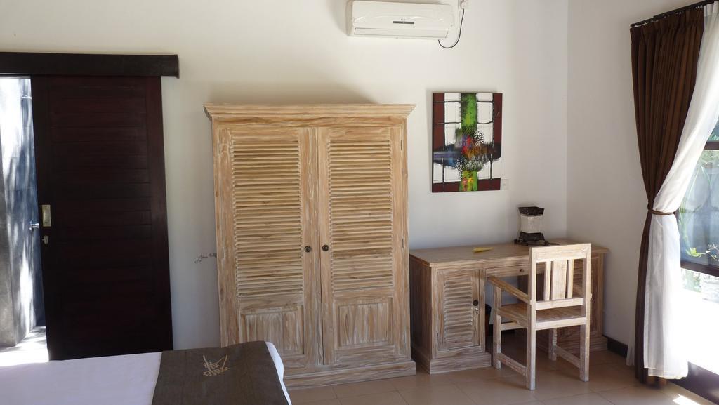 Taman Dewi Sri Villa Et Bungalow Pemuteran Habitación foto