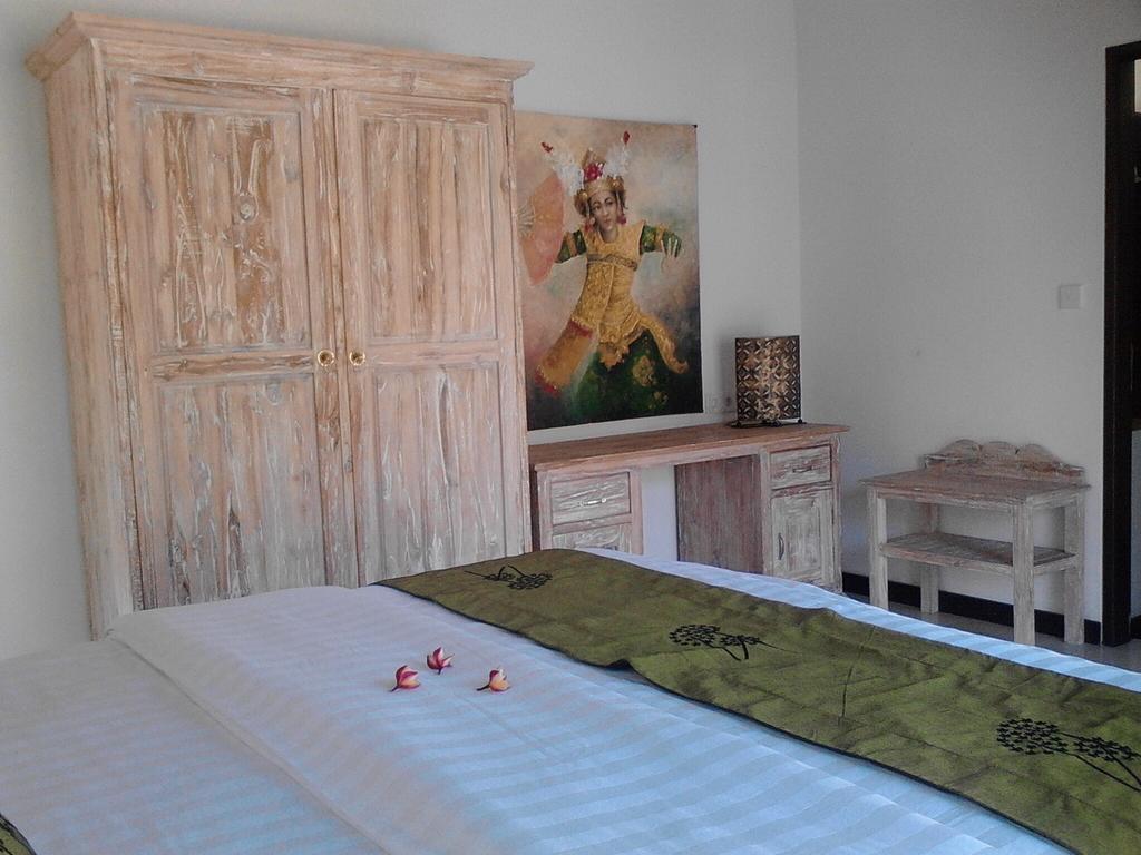 Taman Dewi Sri Villa Et Bungalow Pemuteran Habitación foto